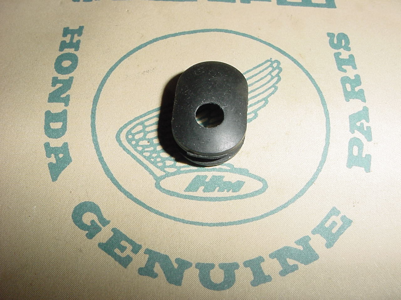 Grommet, throttle cable