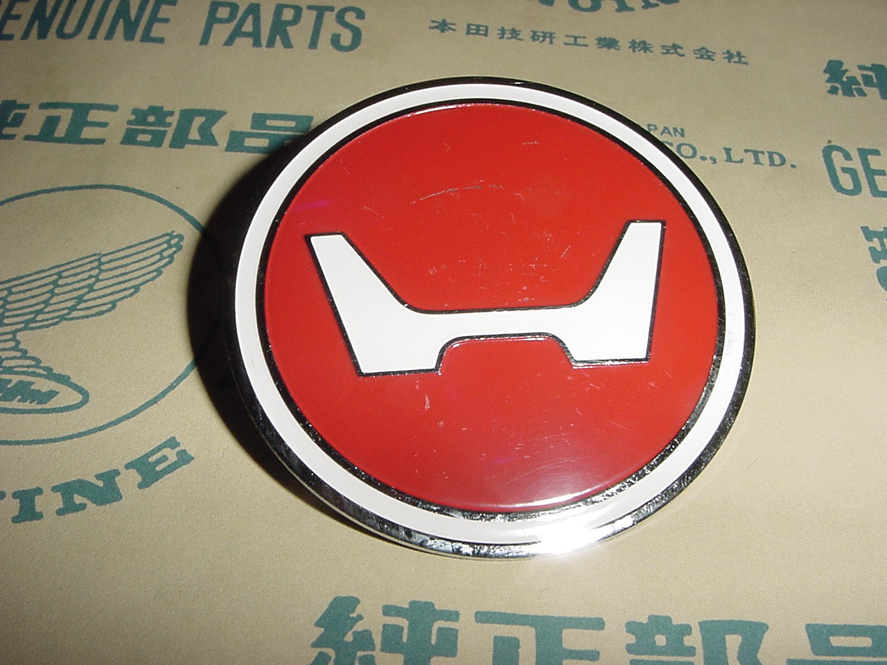 61402-045-670 | Emblem, Headlight Shell / Case. THIS IS FOR HONDA Z50AK1 ONLY.