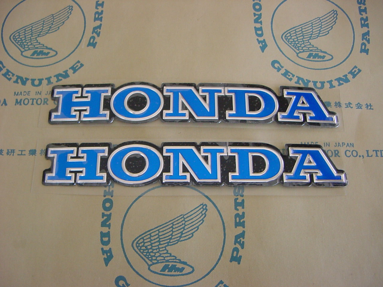 87123-118-000AM | THIS IS A REMAKE EMBLEM. THIS IS LIKE THE EMBLEM THAT CAME ON THE SL70 MOTORCYCLE. THIS IS NOT A CHEAP STICKER. THIS IS FOR HONDA SL70 1971, 1972 ONLY.
A SET OF (2) EMBLEMS IS $75.00.