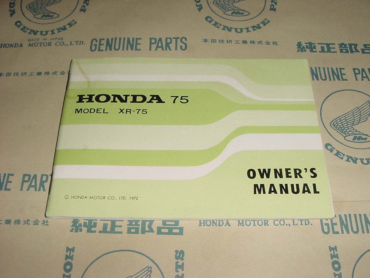 OM3111601 | This is a Honda NOS 1973 XR75 Hand book / Owner's Manual. 
The date on the front cover is 1972. The upper left hand corner has a water stain on it. This item has never been used and is very nice NOS shape!